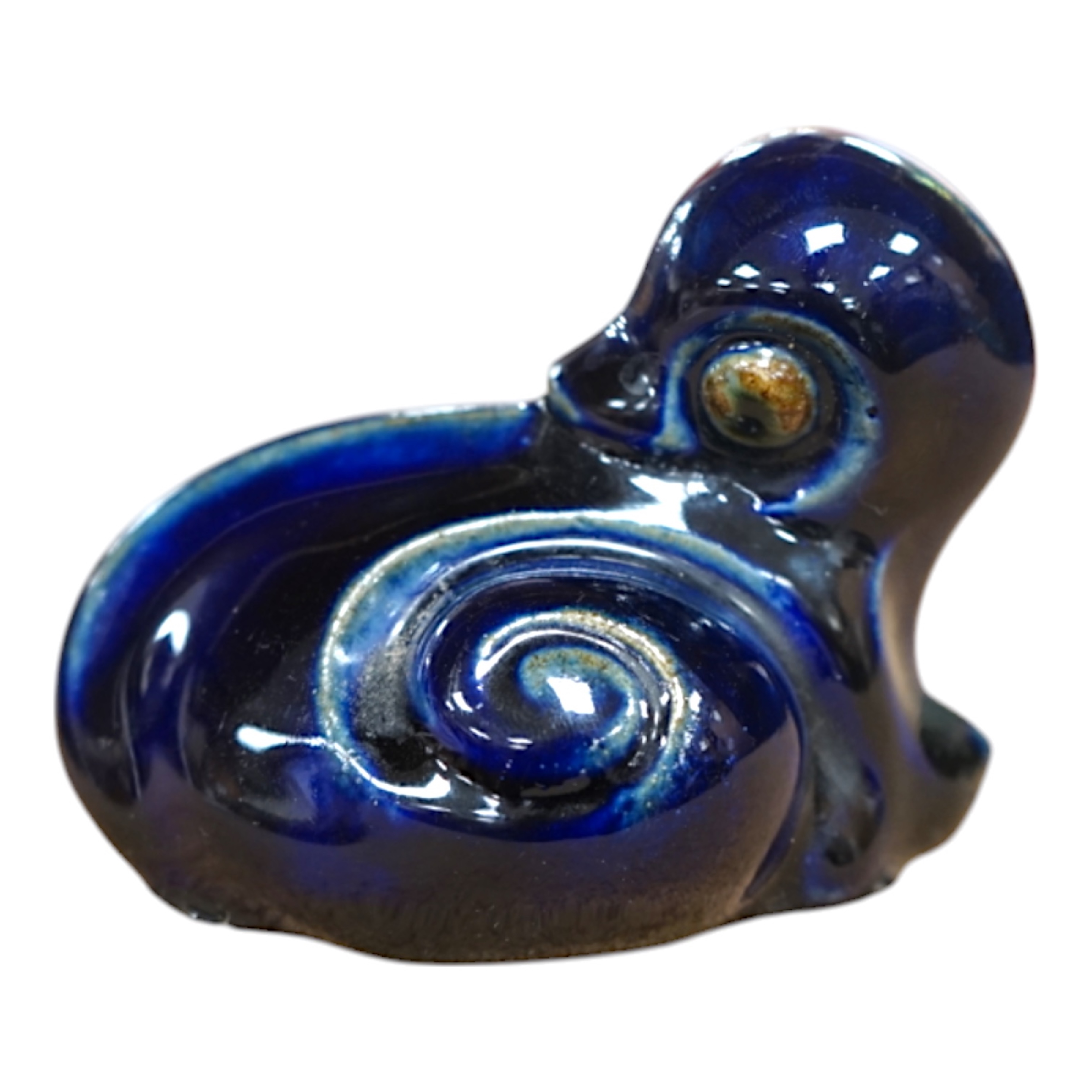 A Royal Doulton stoneware grotesque blue glazed 'duck' by Mark V. Marshall, 9cm wide. Condition - good